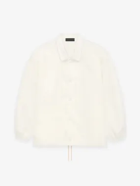 Fear of God Essentials Coaches Jacket in Cloud Dancer