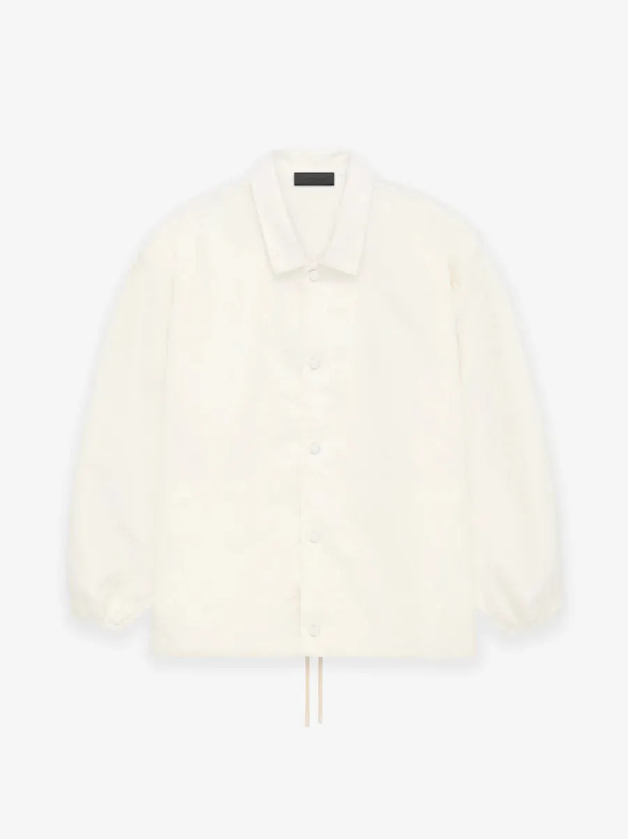 Fear of God Essentials Coaches Jacket in Cloud Dancer